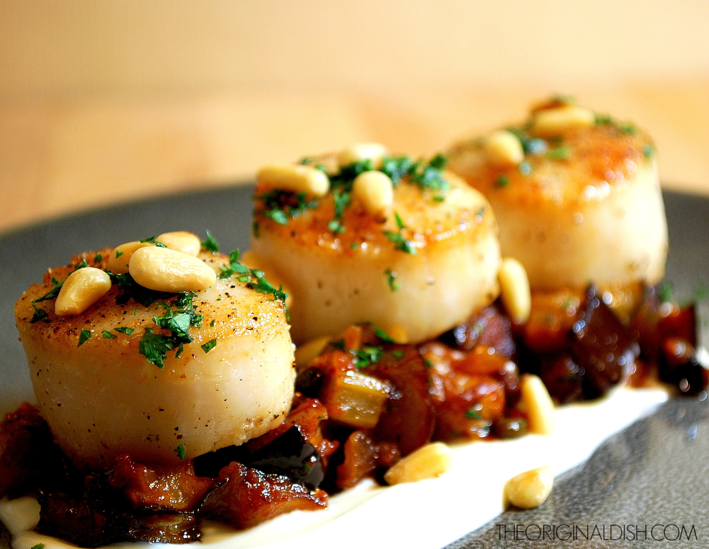 Scallops with Eggplant Caponata olives + currants + pine nuts. 